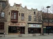 117 N ADAMS ST, a Commercial Vernacular small retail building, built in Green Bay, Wisconsin in 1900.