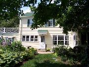227 W GARFIELD AVE, a Colonial Revival/Georgian Revival house, built in Evansville, Wisconsin in 1940.