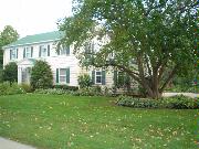 227 W GARFIELD AVE, a Colonial Revival/Georgian Revival house, built in Evansville, Wisconsin in 1940.