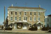 2090 N CHURCH ST, a Greek Revival house, built in East Troy, Wisconsin in 1846.