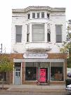 1218-1220 CALEDONIA ST, a Queen Anne retail building, built in La Crosse, Wisconsin in 1895.