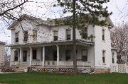 410 1ST ST, a Gabled Ell house, built in Menasha, Wisconsin in 1870.