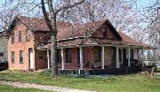 98 BROAD ST, a Gabled Ell house, built in Menasha, Wisconsin in 1870.