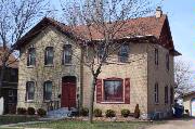 228-230 BROAD ST, a Gabled Ell house, built in Menasha, Wisconsin in 1874.