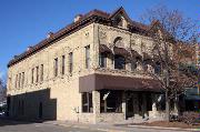 180 MAIN ST, a Italianate retail building, built in Menasha, Wisconsin in 1885.