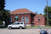 100 RIVER ST, a Colonial Revival/Georgian Revival small office building, built in Menasha, Wisconsin in .