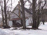 124 S HIGH ST, a Early Gothic Revival house of worship, built in Embarrass, Wisconsin in 1887.