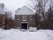 405 W PROSPECT ST, a Dutch Colonial Revival house, built in Rhinelander, Wisconsin in 1920.