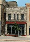225 E WALNUT ST, a Commercial Vernacular small retail building, built in Green Bay, Wisconsin in 1901.