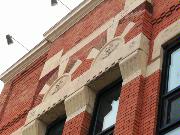 217 N WASHINGTON ST, a Commercial Vernacular small retail building, built in Green Bay, Wisconsin in 1882.