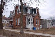 229 N MONROE ST, a Second Empire house, built in Lancaster, Wisconsin in 1874.
