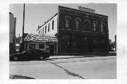 1120 MAIN STREET, a Commercial Vernacular retail building, built in Oconto, Wisconsin in 1900.