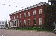 NE CORNER OF N CENTRAL AVE AND E 4TH ST (200 BLOCK OF N CENTRAL AVE), a Commercial Vernacular hotel/motel, built in Owen, Wisconsin in 1906.