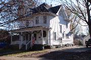 125 GROVE ST, a Queen Anne house, built in Evansville, Wisconsin in 1912.