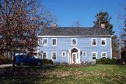 134 GROVE ST, a Colonial Revival/Georgian Revival house, built in Evansville, Wisconsin in 1922.