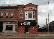715 S BROADWAY, a Commercial Vernacular small retail building, built in Green Bay, Wisconsin in 1908.