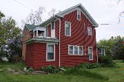 1209 89TH AVE (USH 12), a Gabled Ell house, built in Warren, Wisconsin in 1870.