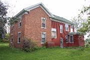 1209 89TH AVE (USH 12), a Gabled Ell house, built in Warren, Wisconsin in 1870.