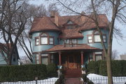 199 E DIVISION ST, a Queen Anne house, built in Fond du Lac, Wisconsin in 1892.
