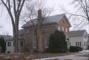 225 SHEBOYGAN ST, a Greek Revival house, built in Fond du Lac, Wisconsin in 1875.