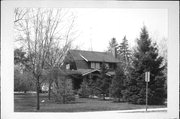 214 S HICKORY ST, a Dutch Colonial Revival house, built in Fond du Lac, Wisconsin in 1908.