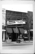 118-120 S MAIN ST, a Commercial Vernacular small retail building, built in Fond du Lac, Wisconsin in 1878.