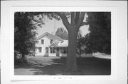 SHELDON RD, AND RR TRACKS, NE CORNER, a Greek Revival house, built in Metomen, Wisconsin in .