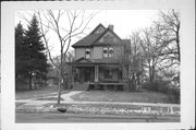 123 E DIVISION ST, a Queen Anne house, built in Fond du Lac, Wisconsin in 1900.