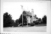 75 W DIVISION ST, a Queen Anne religious residence, built in Fond du Lac, Wisconsin in 1880.