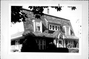 216 WATERTOWN ST, a Dutch Colonial Revival house, built in Ripon, Wisconsin in 1921.