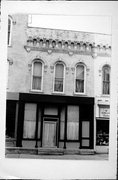 211 WATSON ST, a Commercial Vernacular small retail building, built in Ripon, Wisconsin in 1870.