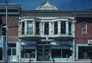 205 W MAPLE ST, a Queen Anne large retail building, built in Lancaster, Wisconsin in 1904.