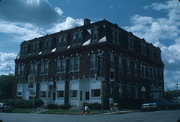 108 N WASHINGTON ST, a Second Empire lodging-hotel, built in Lancaster, Wisconsin in 1884.