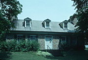 JEWETT AND LANCASTER STS., a Greek Revival house, built in Platteville, Wisconsin in 1837.