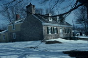 JEWETT AND LANCASTER STS., a Greek Revival house, built in Platteville, Wisconsin in 1837.