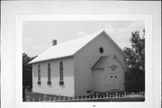 W SIDE OF D, 350' N OF ROCK RD, a Greek Revival church, built in Smelser, Wisconsin in 1843.