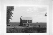 S SIDE OF 81, 1/8 MILE W OF LAFAYETTE CO. LINE (1/3 MILE E OF 80-81)., a Greek Revival house, built in Smelser, Wisconsin in .