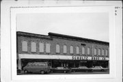 1012-1022 WISCONSIN AVE, a Italianate large retail building, built in Boscobel, Wisconsin in 1876.