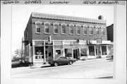 125-129 N MADISON ST, a Italianate large retail building, built in Lancaster, Wisconsin in 1896.