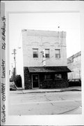 126 N MADISON ST, a Commercial Vernacular small retail building, built in Lancaster, Wisconsin in 1889.
