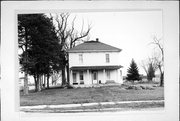 1001 N MADISON ST, a Two Story Cube house, built in Lancaster, Wisconsin in 1900.