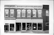 141 E MAPLE ST, a Italianate retail building, built in Lancaster, Wisconsin in 1892.