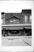 CA129 W MAPLE ST, a Commercial Vernacular small retail building, built in Lancaster, Wisconsin in 1990.