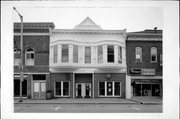 205 W MAPLE ST, a Queen Anne large retail building, built in Lancaster, Wisconsin in 1904.