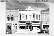 205 W MAPLE ST, a Queen Anne large retail building, built in Lancaster, Wisconsin in 1904.