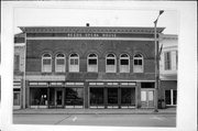 219 W MAPLE ST, a Romanesque Revival opera house/concert hall, built in Lancaster, Wisconsin in 1894.