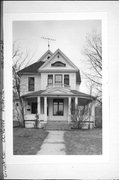 410 W PINE ST, a Queen Anne house, built in Platteville, Wisconsin in 1898.