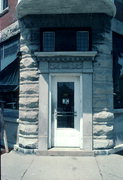 NW CORNER OF EXHANGE ST AND CENTER AVE, a Queen Anne small office building, built in Brodhead, Wisconsin in 1900.