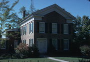 621 14TH AVE, a Greek Revival house, built in Monroe, Wisconsin in 1857.