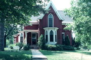 1403 14TH AVE, a Early Gothic Revival house, built in Monroe, Wisconsin in 1858.